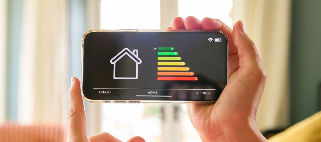 Hands use an energy efficient app to check power usage
