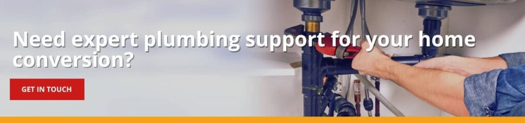 Banner with text "Need expert plumbing support for your home conversion?" and a 'Get in Touch' button beside a plumber working under a sink